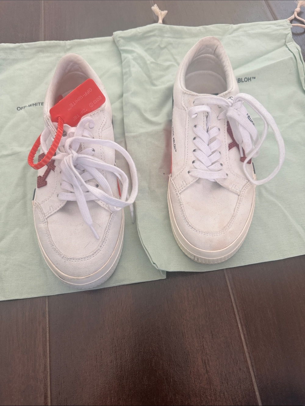 Authentic Off-White White Low-Top Sneakers with Red Arrow Detail